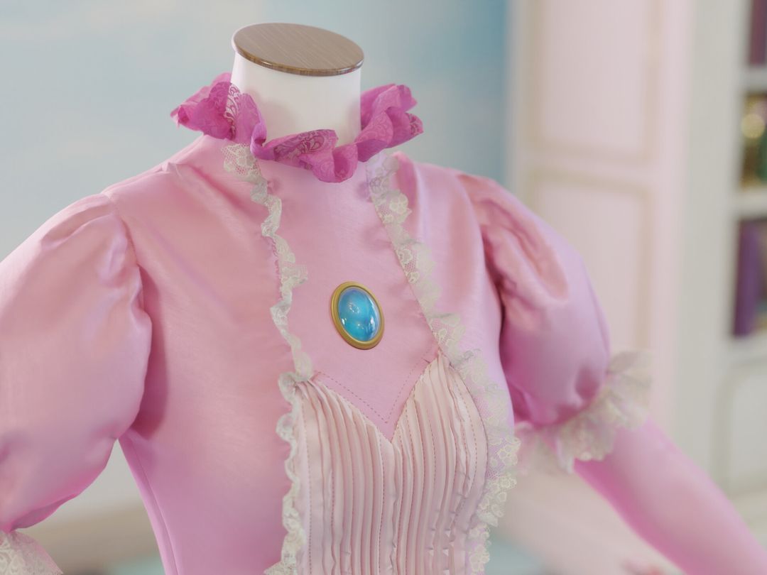 A Pink Dress and a Blue Brooch